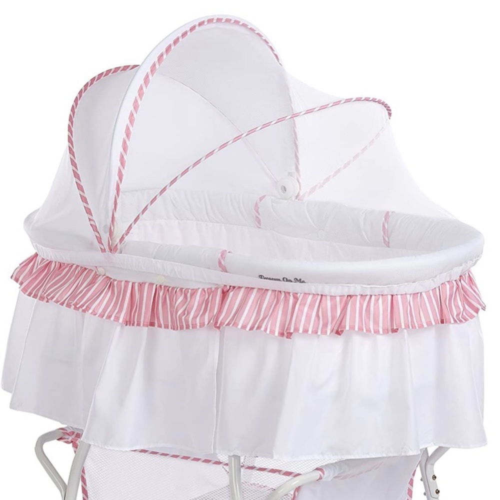 Dream on Me pink lace bassinet